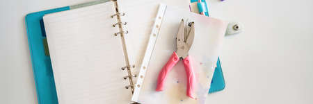 Notepad and stationery on white background. Planner for business and study. Fans of stationery...