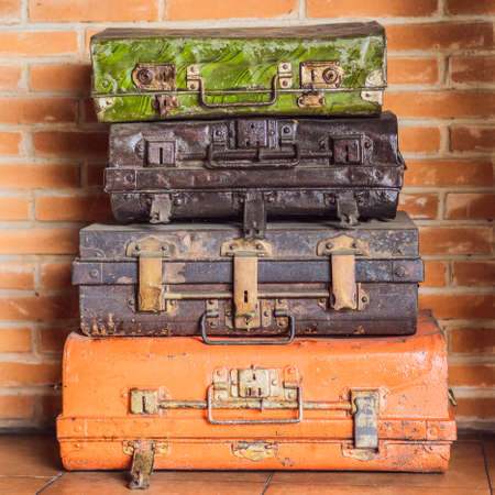 Collage of retro travel suitcases. Set of old suitcases. Brown and black retro suitcase. Vintage baggage. Vintage travel bagsの写真素材