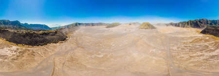 Panoramic Aerial shot of the Bromo volcano and Batok volcano at the Bromo Tengger Semeru National Park on Java Island, Indonesia. One of the most famous volcanic objects in the world. Travel to Indonesia conceptの写真素材