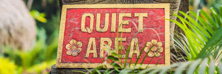 A sign QUIET AREA in a quiet corner of the garden BANNER, LONG FORMATの写真素材