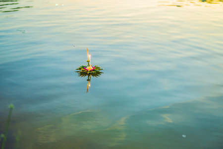 Loy Krathong festival, People buy flowers and candle to light and float on water to celebrate the...
