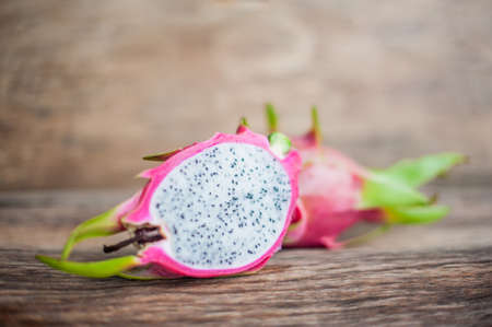 Healthy dragon fruits on old woodenの写真素材