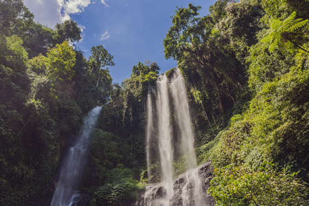 Beautiful tropical Sekumpul Waterfall in Bali, Indonesiaの写真素材