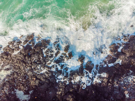 Aerial view of sea waves and fantastic Rocky coastの写真素材
