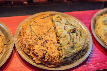 Typical Korean street food on a walking street of Seoul. Spicy fast food simply found at local...