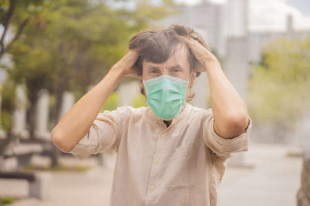 Men wearing facial hygienic mask for Safety outdoor.の写真素材
