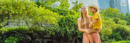 Mom and son tourists in Cheonggyecheon stream in Seoul, Korea.の写真素材