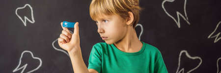 BANNER, LONG FORMAT Six-year old boy shows myofunctional trainer. Helps equalize the growing teeth...