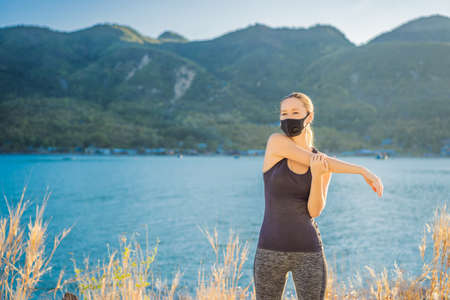 Runner wearing medical mask, Coronavirus pandemic Covid-19. Sport, Active life in quarantine...
