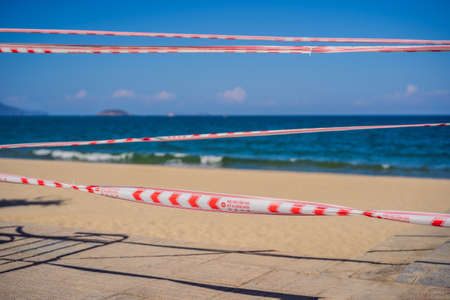 Corona Virus threat closes beaches and public places in many countries. The inscription NOT ALLOWED...