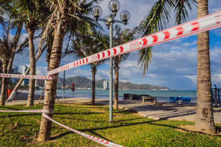 Corona Virus threat closes beaches and public places in many countries. The inscription NOT ALLOWED AREAの写真素材