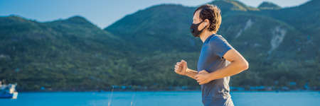 Runner wearing medical mask, Coronavirus pandemic Covid-19.
