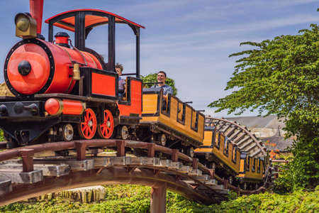 People on a roller coaster have funの写真素材