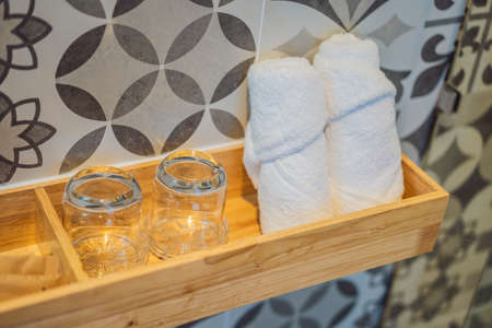 towels glasses and toiletries for couple prepared to useの写真素材
