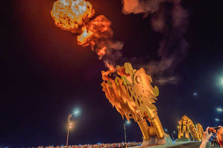 dragon making fire on the Dragon Bridge, a famous bridge in Da Nang. Da Nang City is Famous city for...
