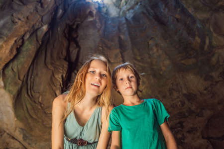 Mom and son tourists in Beautiful Marble mountains and Da Nang, Vietnam. Traveling with children conceptの写真素材