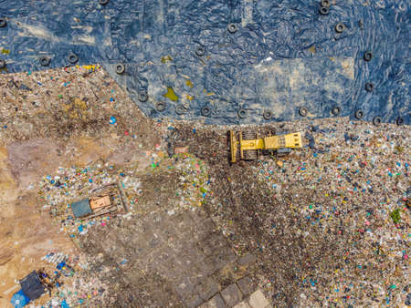 Aerial top view photo from flying drone of large garbage pile. Garbage pile in trash dump or landfill. Environmental pollutionの写真素材