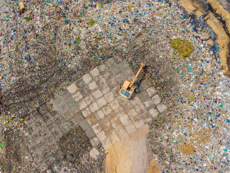 Aerial top view photo from flying drone of large garbage pile. Garbage pile in trash dump or...