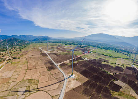solar energy panels and wind turbine. Drone view