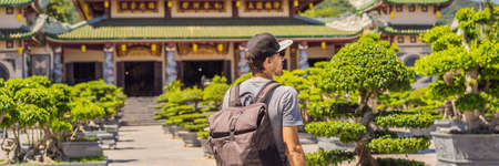 Man tourist in Chua Linh Ung Bai But Temple, Lady Buddha Temple in Da Nang, Vietnam BANNER, LONG FORMATの写真素材