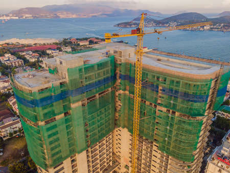 Crane and building under construction. Construction work site
