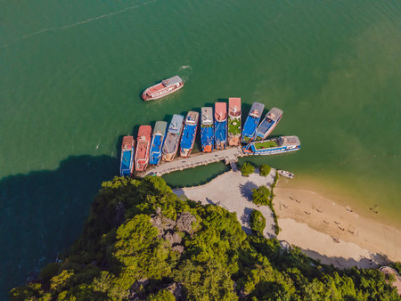Aerial view panorama of floating fishing village and rock island, Halong Bay, Vietnam, Southeast Asia.の写真素材