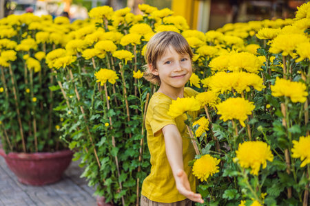 Caucasian tourist boy in Tet holidays. Vietnam in springtimeの写真素材