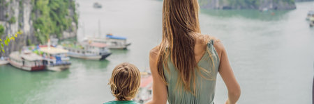 BANNER, LONG FORMAT Mom and son travelers in Halong Bay. Vietnam. Travel to Asia, happiness emotion, summer holiday concept. Picturesque sea landscape. Ha Long Bay, Vietnam. After coronavirus COVID 19の写真素材
