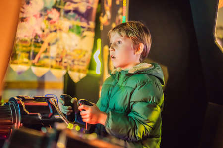 The boy is playing a slot machine. Creativity Game concept