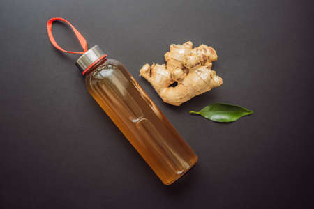 Ginger Ale - Homemade lemon and ginger organic probiotic drink or Kombucha, copy space