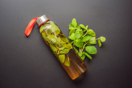 Kombucha tea super food pro biotic beverage in glasses with mint on wooden background - homemade healthy organic fermented probiotic drinkの写真素材