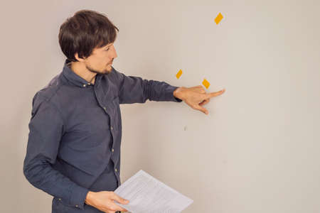 The realtor checks the condition of the apartment when the tenants are about to move out. The walls...