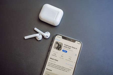 February 23, 2021, USA, New York: Clubhouse audio chat application view on the smartphone IPhone 12...