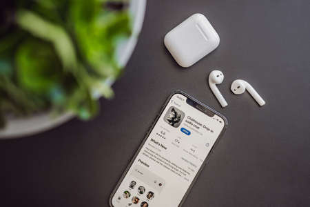 February 23, 2021, USA, New York: Clubhouse audio chat application view on the smartphone IPhone 12 pro. Clubhouse gained incredible popularity in early 2021のeditorial素材