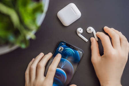 February 23, 2021, USA, New York: Clubhouse audio chat application view on the smartphone IPhone 12...