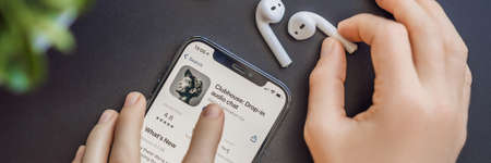 February 23, 2021, USA, New York: Clubhouse audio chat application view on the smartphone IPhone 12...
