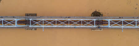 Aerial view of railway bridge over the river BANNER, LONG FORMAT