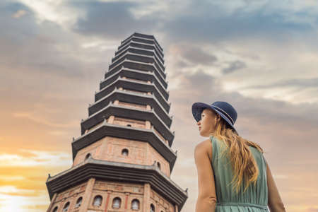 Woman tourist in Temple tower of Bai Dinh pagoda in Ninh Binh, Vietnam.の写真素材