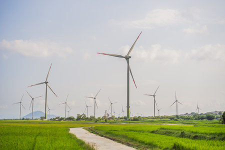 Wind power plant. green meadow with Wind turbines generating electricity