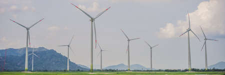 Wind power plant. green meadow with Wind turbines generating electricity BANNER, LONG FORMAT