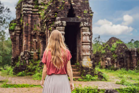 Woman tourist in Temple ruin of the My Son complex, Vietnam. Vietnam opens to tourists again after quarantineの写真素材