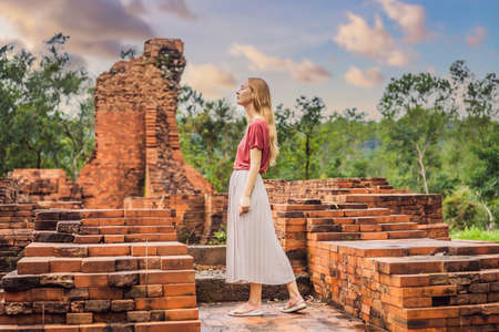Woman tourist in Temple ruin of the My Son complex, Vietnam.の写真素材