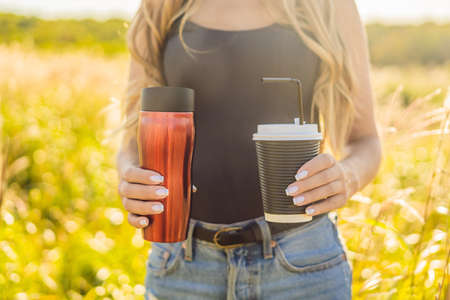 Zero waste concept Use disposable or reusable cup for coffee. Zero waste, green and conscious lifestyle concept. Reusable on the go drink container ideasの写真素材