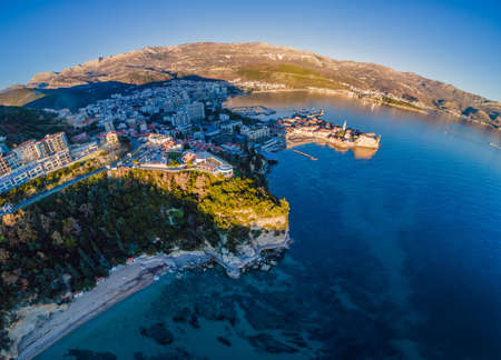 Landscape of Old town Budva: Ancient walls and red tiled roof. Montenegro, Europe. Budva - one of the best preserved medieval cities in the Mediterranean and most popular resorts of Adriatic Riviera.の写真素材