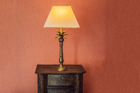 Bright eco light in the corner of a modern bedroom. New led technology meets traditional interior...