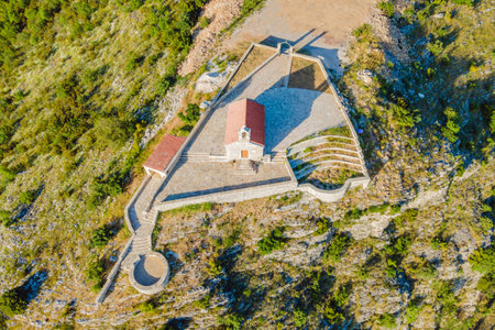 The Church of St. Sava in Montenegro, near the island of Sveti Stefan near Budwa. Drone view. Location: church St. Sava, Montenegro, Balkans, Adriatic sea, Europe.の写真素材