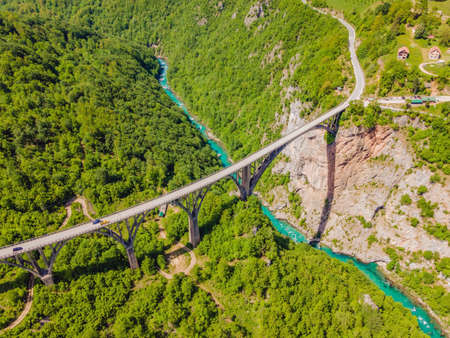 Montenegro. Dzhurdzhevich Bridge Over The River Tara Portrait of a disgruntled girl sitting at a cafe tableの写真素材