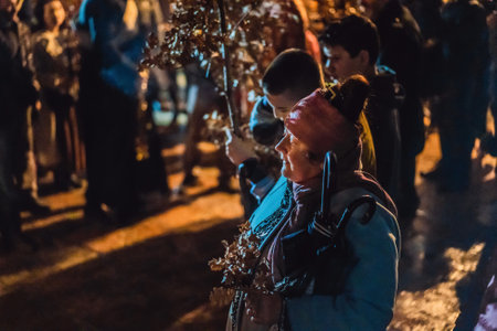 Montenegro, Budva 7.01. 2021: Christian Christmas in Montenegro, the feast of the oak branch. People burn an oak branch in honor of Christmasのeditorial素材