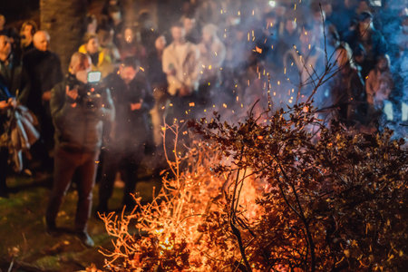Montenegro, Budva 7.01. 2021: Christian Christmas in Montenegro, the feast of the oak branch. People burn an oak branch in honor of Christmasのeditorial素材