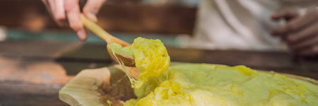 BANNER, LONG FORMAT Traditional Montenegrin Meal. Kacamak in wooden bowl in the outdoor cafe...
